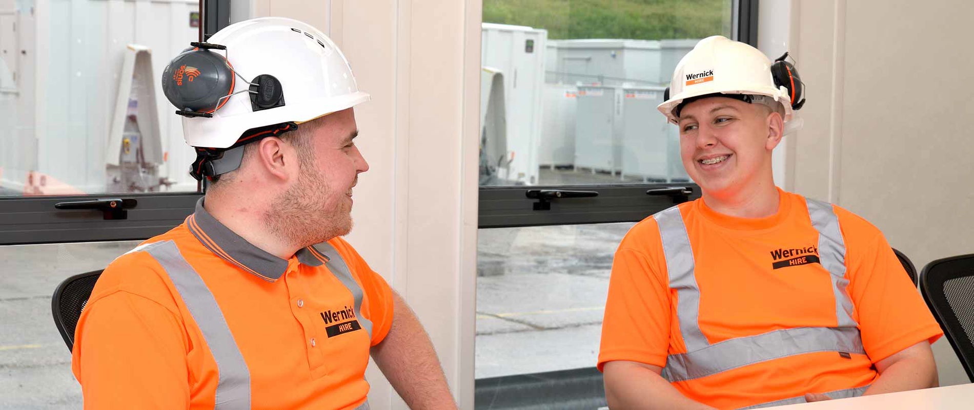 image of two employees looking at each other