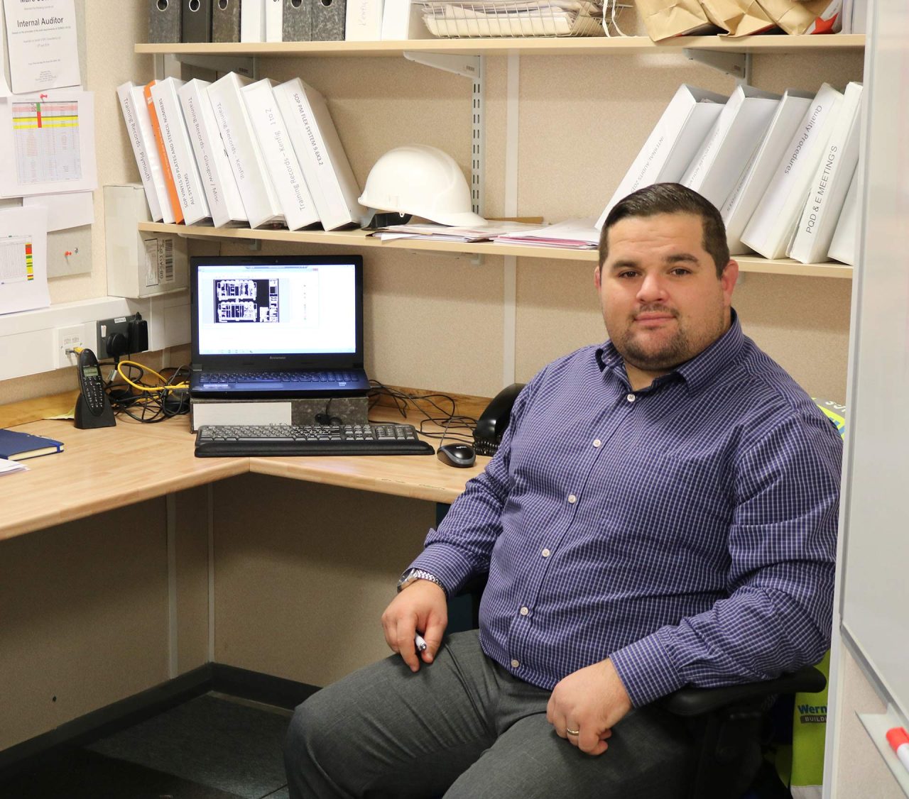image of employee at desk