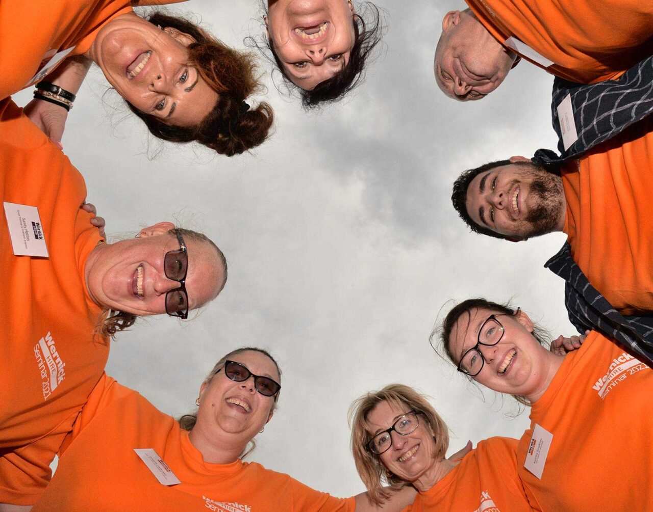 image of employees looking down