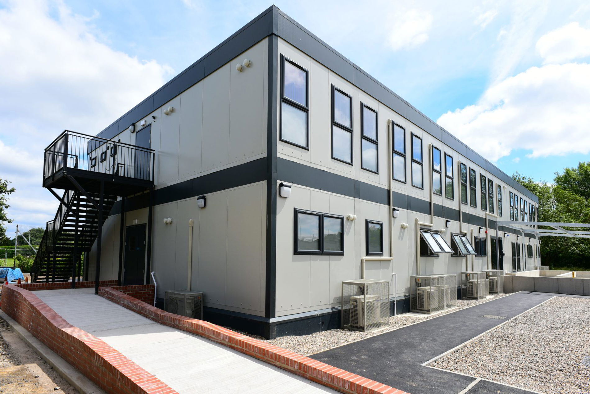 Image of a University hospital double storey office refurbished modular building with grey cladding