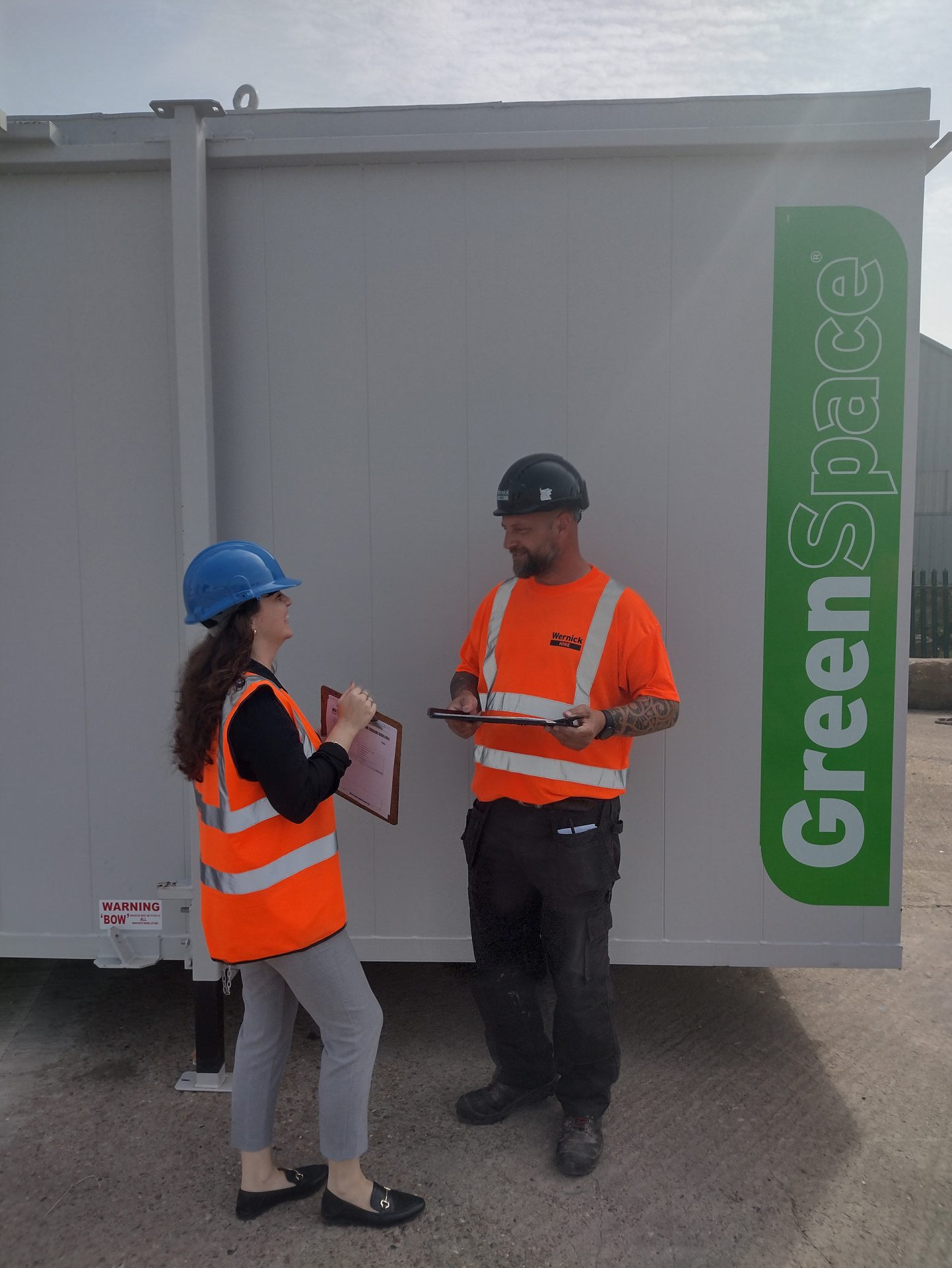 Image of two employees