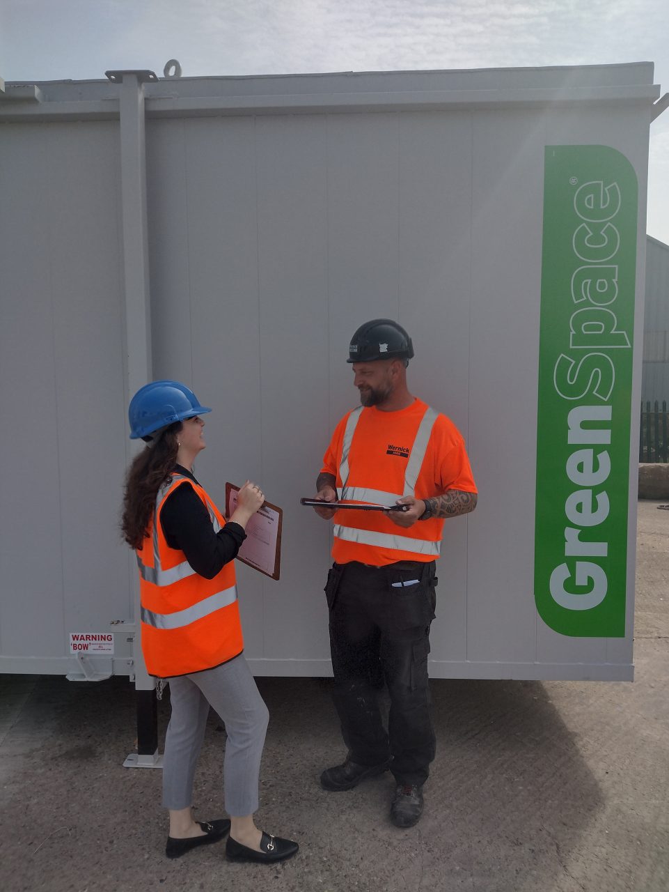 Image of two employees