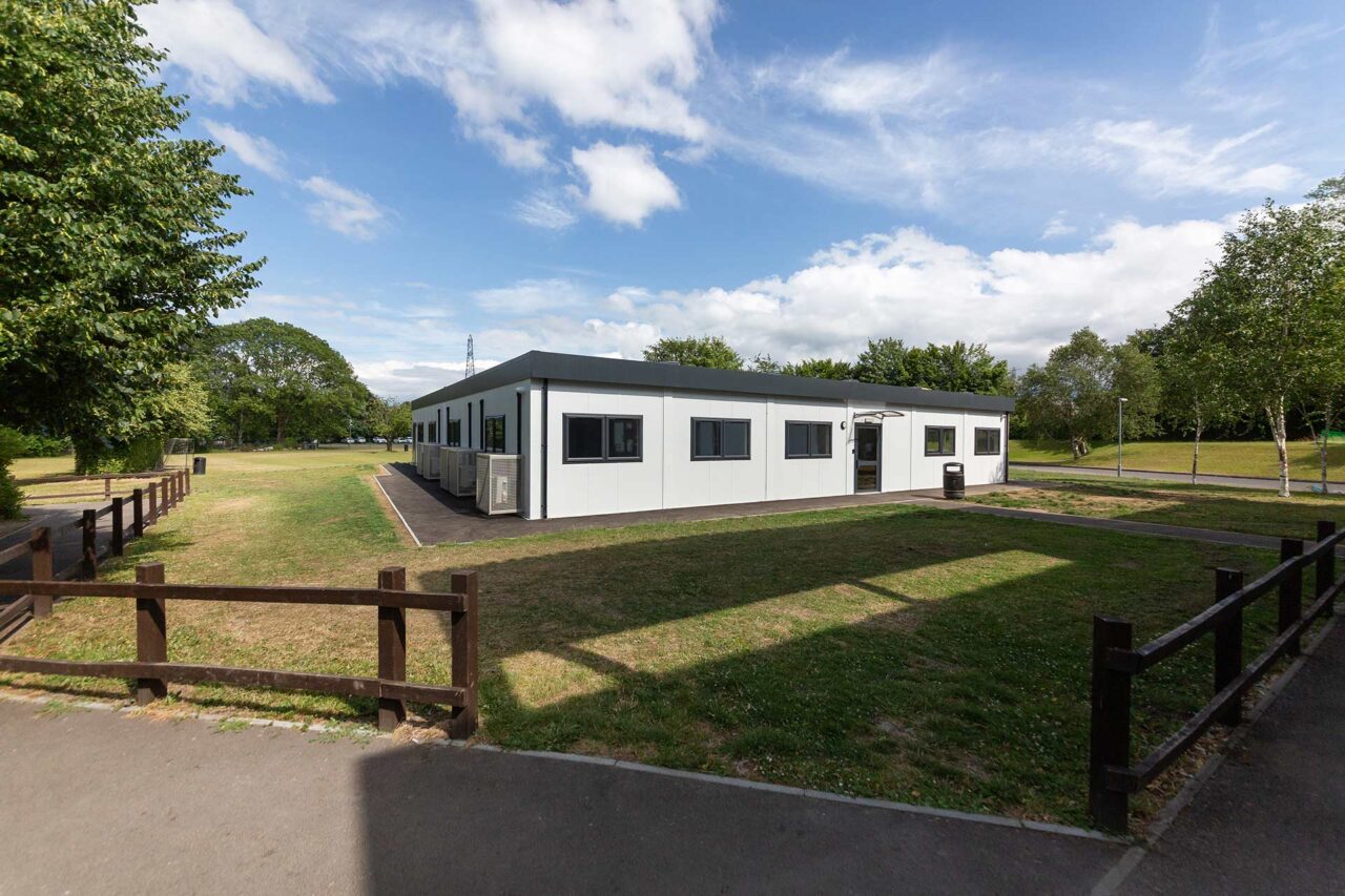 Image of a refurbished modular classroom building with grey features